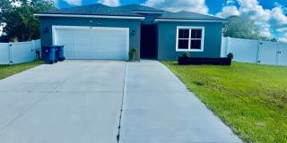 Spacious 4-Bedroom Home with Modern Features & Fully Fenced Pet-Friendly Yard Gallery 1