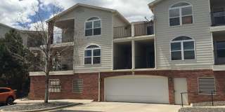 Available Now- 2 Bed/2 Bath Top Floor Condo with Covered Garage Space and Additional Storage Gallery 1
