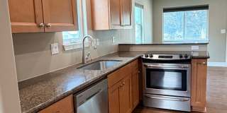 Spacious 2 bed/1 bath home! Fenced yard, a/c, d/w, w/d, large garage and MORE!! Gallery 12