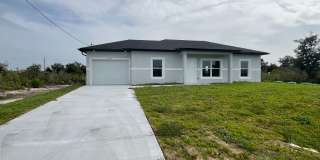 NEW CONSTRUCTION- Modern 3 Bed / 2 Bath Home in Lehigh Acres Gallery 1