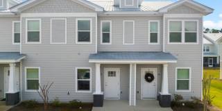 Affordable Coastal Living with Peaceful Wooded Views! Gallery 1
