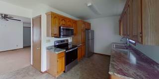 Two story duplex with two large bedrooms, walk in closet, one and a half bath, full basement. Gallery 1