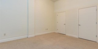 Gorgeous two bedroom two bath with 1574 ft. Two parking spaces included balcony, beautiful rooftop deck no pets. Gallery 8