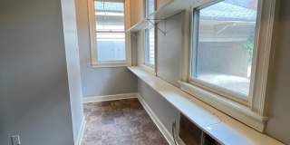 Central Gardens home with 4BR/2ba up w office/flex space. Wrap around, covered front porch! Pets are owners approval. Gallery 13