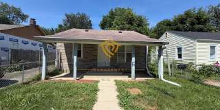 Charming 3-Bedroom Stone Bungalow with 2-Car Detached Garage & Fenced Yard, Available NOW! Gallery 1