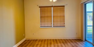 Experience Bell Tower Park. GATED ground floor 2 Bed 2 Bath Den 1 Car Garage Condo. Gallery 37