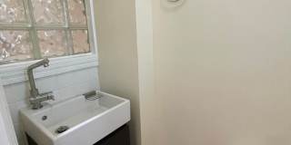 Charming 1928 Row Home for Rent with Modern Amenities — 3 Bedroom 2 Full Bath w/ 2 Half Baths, 2 Kitchens, located in Kingman Park, Near DC Armory & Eastern Market Gallery 62