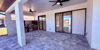 Brand-New Waterfront Luxury in Cape Coral | Heated Pool, Spa, Outdoor Kitchen & 3-Car Garage Gallery 34