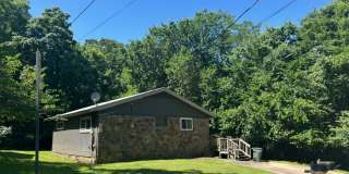 Two Bedroom Cottage Style Home Nestled in the Woods Gallery 1