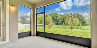 Well laid out 4 Beds/3Bths plus Den, screened Lanai on nature preserve in a well sort after K-Bar Range gated community! Gallery 33