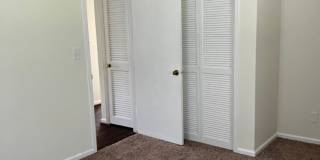 Updated 2 bedroom, 1 bath apartment with walk-out patio off of kitchen, and updated flooring. Gallery 4