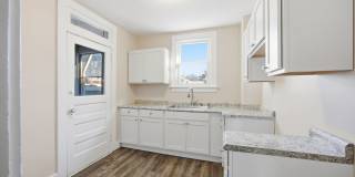 Charming Updated 2BR Home with New Flooring & Rear Porch Gallery 3