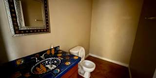 spacious 4-bedroom, 3-bathroom house is perfect for those looking for a comfortable and convenient living space. Gallery 9