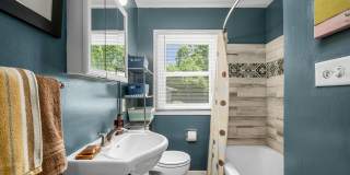 Charming Wheaton Cottage w/ Solar Panels, Finished Basement & 2-Car Garage Gallery 6
