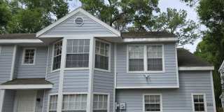 Spacious 2-bedroom, 1.5-bath end-unit townhouse in Carriage House Gallery 1