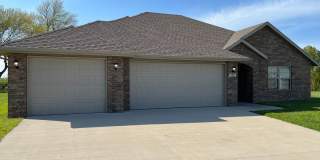 4 bedroom, 2 bathroom, and a 3 car garage in Republic!! Check this out! COMING SOON Gallery 1