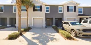 Spacious 3 Bed, 2.5 Bath Townhouse with Garage  Private Patio – Water Included! Gallery 1