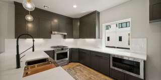 Discover modern elegance in the newly constructed Edgewater Condominiums, a boutique community featuring 18 luxurious units with 9 still available for purchase. Gallery 45