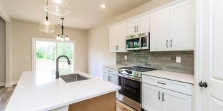 Beautiful 4BR 2.5BA Home w/ Full Appliance Kitchen • Garage Parking • Gallery 7