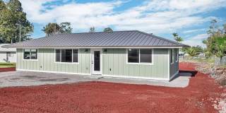 Modern 3BD/2BA Home in Ainaloa | Front Gate & Partially Fenced Yard | $2,300 Gallery 1