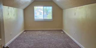 3bed/2bath w/3 car garage, upstairs bonus room, vaulted ceilings, & fenced yard. Gallery 29