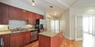 Gorgeous 2b/2ba in Uptown w/ Private Patio, In-Unit W/D, Massive Roof Deck and Elevator Gallery 1