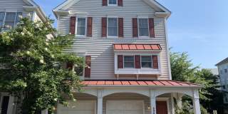 COMING SOON! END UNIT Lakelands TH Style Cottage with 2-car Garage Gallery 1