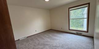 August 15th rent special! New deck! 3 Bedroom, updated kitchen, updated flooring, garage, driveway, and fenced yard - 9 month lease available! Gallery 17