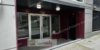 GORGEOUS!! 1 Bedroom + 2 Baths + Den w/Secured Parking Spot in Prime Seattle Location! Gallery 1