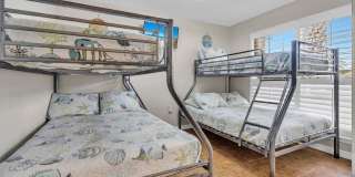 Gorgeous 4 bedroom pool house for rent w/ deeded beach access + pool & yard service included in the rent! Gallery 6