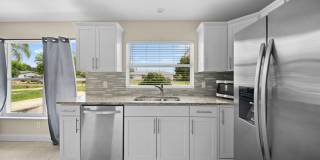 Beautiful 3 bedroom 2 bathroom single family home in Fort Myers with fenced yard! Gallery 11