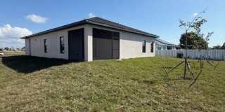 Brand-New Luxury Home with 3-Car Garage & Lawn Care Included | Modern Living in Cape Coral! Gallery 31