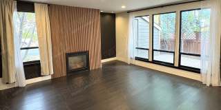 Downtown Corner Condo 1 BR - 1.5 BA Gallery 1