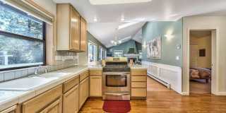 "Minnow's Run" ~ Top Floor Unit of Triplex with Private Deck, Wood Burning Fireplace & Fenced Back Yard Gallery 1