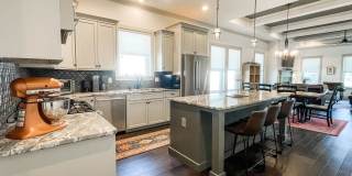 Custom built, almost brand new one story 3/2 home with all of the East Hill charm! Gallery 7