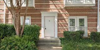 This townhouse style condo is located across the street from the Vienna Metro Station (Orange Line). Gallery 1