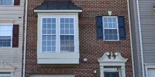 Spacious 3-Story Townhouse with One-Car Garage Gallery 1