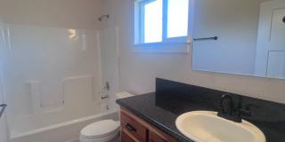 2 Bedroom 1 bath house with extra large double car garage and extra storage space! Gallery 17