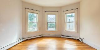 Renovated Apt Near NEU!  Laundry in Unit! 1k Rebate Upon closing with Promo Gallery 6