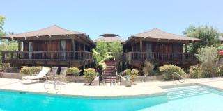 Very private, mostly furnished, rustic Maui Meadows home with large pool, walk around deck with panoramic ocean views. Available for 6 months only. Gallery 1