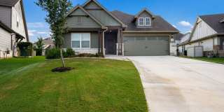 4 Bedroom Home with Stone Patio, Built-In Gazebo & Amenity-Rich Community Living Gallery 1
