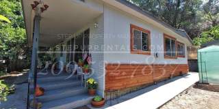 Charming Vintage Gem with Private Frontyard Oasis and Modern Updates Gallery 1