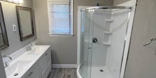 4 Bed / 2 bath! Large yard w/ carport & central HVAC! Gallery 1