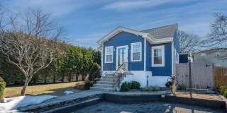 Beautifully Renovated Contemporary Cape with Private Backyard Gallery 1