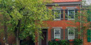 AVAILABLE NOW! Restored historic downtown Carlisle rental with fenced yard, pond, balcony, and hardwood floors Gallery 1