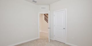 Stunning 4/3 Modern Townhome with a Private Courtyard and a 2 Car Garage in the Desirable Community Pinewood Reserve - Orlando! Gallery 9