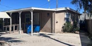 2br 1Ba Home with large Gated Patio Front/Rear yard plus garden area Gallery 1