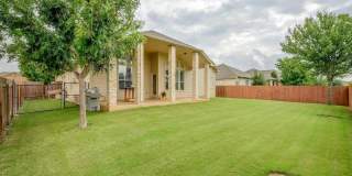 Beautiful one story stone home in Estates at Settlers Park Gallery 21