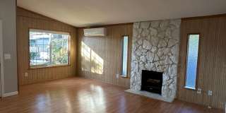 Spacious  Stylish 3BD Home with Iconic Stone Fireplace + Soaking Tub Gallery 1