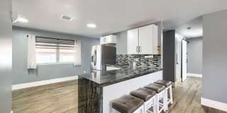 MODERN REMODELED 2 BEDROOM HOME WITH SOLAR & HUGE BACKYARD! Gallery 1